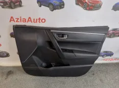 Обшивка двери передняя правая Toyota Corolla E180
