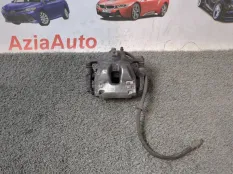 Суппорт тормозной передний левый Toyota Corolla