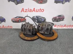 Суппорт тормозной передний Toyota Camry XV70