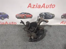 Кулак задний левый Toyota Camry XV70