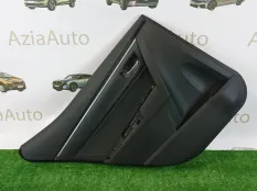 Обшивка двери задняя левая Toyota Corolla E180