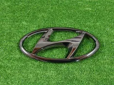 Эмблема передняя Hyundai Tucson NX4